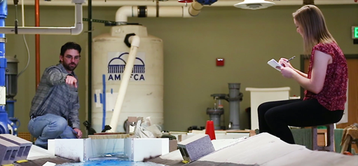 photo: Man and woman working in the hydraulic laboratory